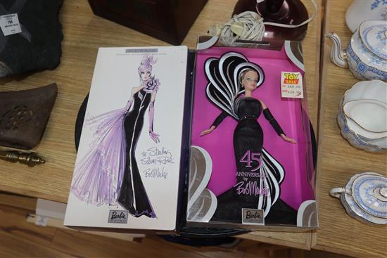 Five Bob Mackie Barbie dolls: Holiday Barbie (2), Mackie Brunette Brilliance, 45th Anniversary and The Sterling Silver